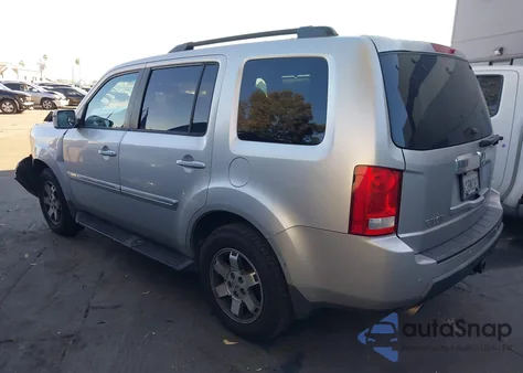 2011 Honda Pilot Touring z USA, uszkodzony, nr VIN 5FNYF3H97BB054681